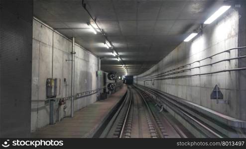 View on interior of metropolitan tunnel with artificial light. Interior of metropolitan