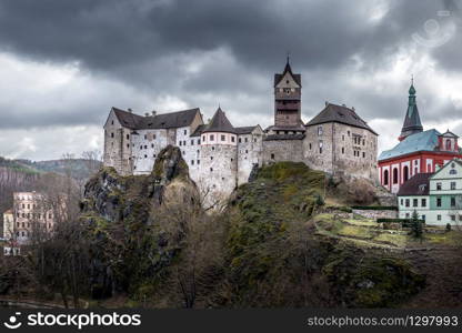 View on Loket town with medieval royal castle near Karlovy Vary Resort in Czechia