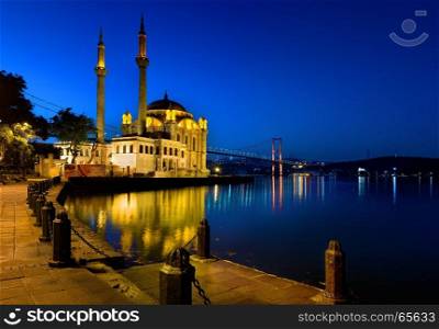 View on Ortakoy Mosque and Bosphorus in Istanbul at sunrise, Turkey