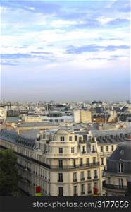 View on Paris rooftops with blue sky
