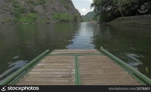 View on river hill forest and park from raft floating along river. National park Phong Nha-Ke Bang, Vietnam