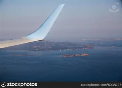 View on Sardinia with wing of airplane