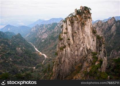 view on Shixin  Beginning-to-Believe  peak in Huangshan mountain  Yellow mountain , known as the loveliest mountain of China, World Natural and Cultural Heritage site by UNESCO, Anhui, China.. Shixin Beginning-to-Believe peak in Huangshan mountain, known as Yellow mountain, Anhui, China.