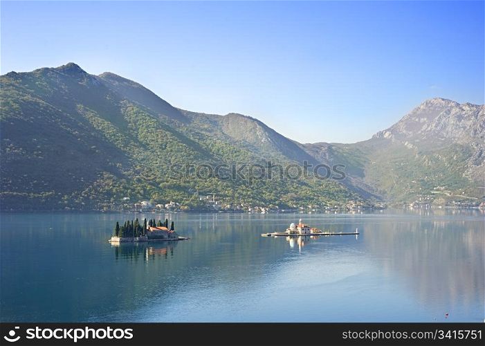 "View on Sv.Djordje (left) and Gospa od Skrpjela ( right) alo known as Church "Our Lady of the rocks" in the morning. Perast, Montenegro"