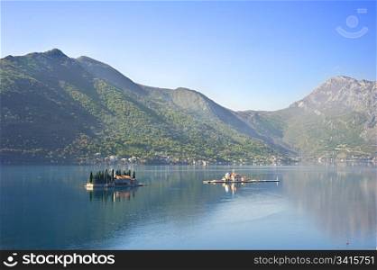 "View on Sv.Djordje (left) and Gospa od Skrpjela ( right) alo known as Church "Our Lady of the rocks" in the morning. Perast, Montenegro"