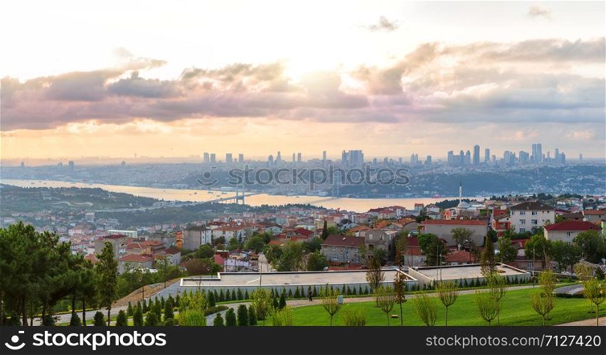 View on the Bosphorus Bridge and Istanbul skyscrappers from Camlica Hill, Turkey.. View on the Bosphorus Bridge and Istanbul skyscrappers from Camlica Hill, Turkey