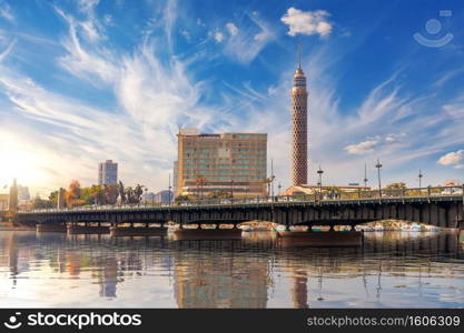 View on the Cairo Tower in Gezira island and the bridge over the Nile, Egypt.