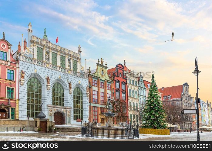View on the Neptune's Fountain and the the Artus Court facade in Long Market, Gdansk, Poland, no people.. View on the Neptune's Fountain and the the Artus Court facade in Long Market, Gdansk, Poland, no people