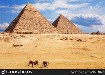 View on the Pyramid of Khafre and the Pyramid of Khufu, desert of Giza, Egypt.. View on the Pyramid of Khafre and the Pyramid of Khufu, desert of Giza, Egypt