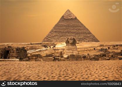 View on the Sphinx and the Pyramids, Giza desert, Egypt.. View on the Sphinx and the Pyramids, Giza desert, Egypt