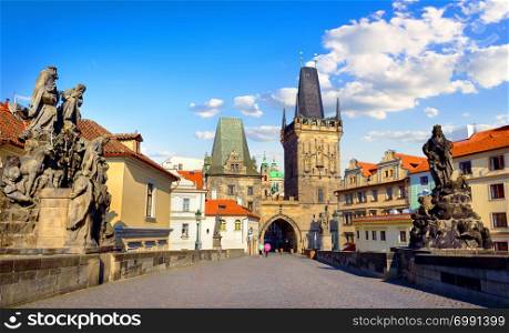View on towers and sculptures of Charles Bridge in Prague