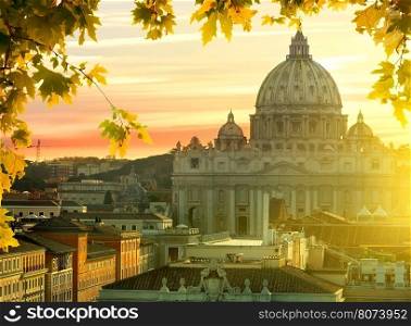 View on Vatican and roofs of houses at sunset in autumn, Rome, Italy