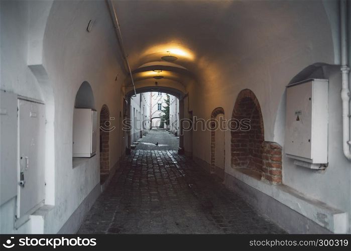 View on Vilnius old town street from house arc