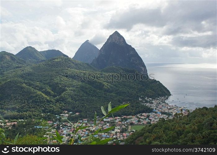 View over Soufriere with the famous volcano peaks of the Pitons in the background. Saint Lucia, Caribbean.