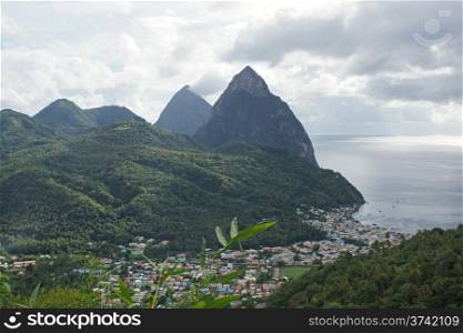 View over Soufriere with the famous volcano peaks of the Pitons in the background. Saint Lucia, Caribbean.