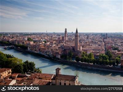 View over the rooftops of Verona, Italy as the sun is setting in the evening