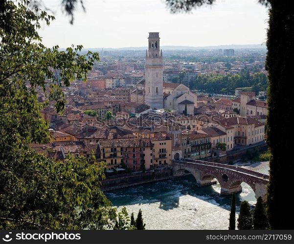 View over the rooftops of Verona, Italy with Cathedral and Ponte Pietra