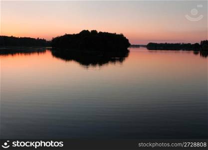 View reservoir after sunset in the quiet weather. Khmelnitsky, Ukraine