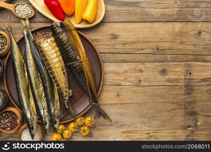 view smoked fishes wooden table