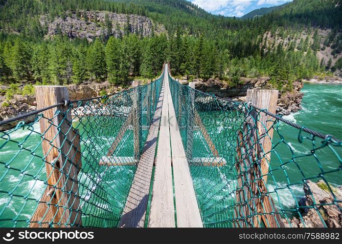 view to a large suspension bridge on Kootenai river