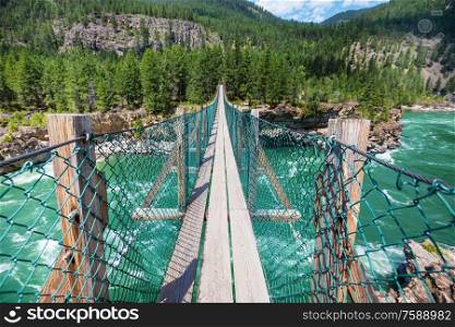 view to a large suspension bridge on Kootenai river