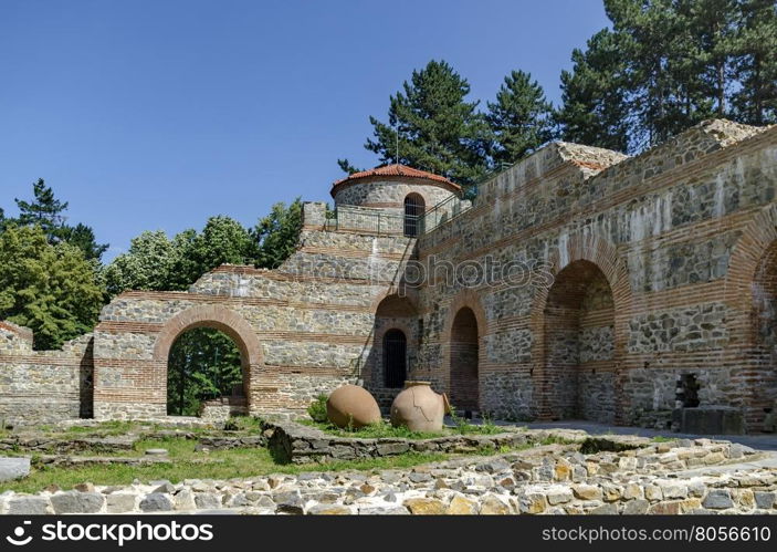 View to restored inside park of castle Hisarlak with earthen vessel, near by Kyustendil town, Bulgaria