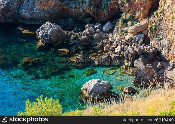 View to sea bay from coastline trail of Zingaro Nature Reserve Park, between San Vito lo Capo and Scopello, Trapani province, Sicily, Italy