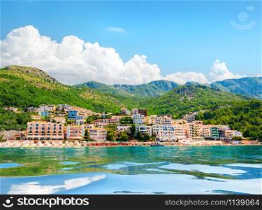 View to the city on Adriatic sea coast near Sveti Stefan island, Montenegro