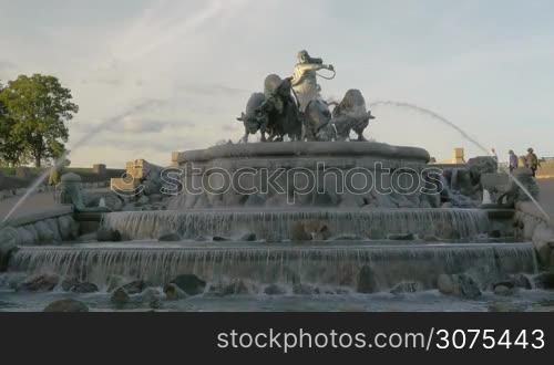 View to the grand Gefion Fountain, landmark of Copenhagen, Denmark. Sculpture of Norse goddess Gefjun with bulls on the top