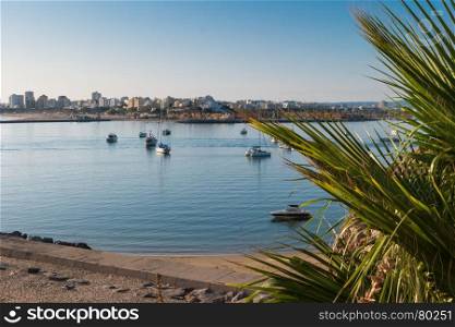 View to the yacht marina of Portimao. View from the beach of the Molhe in Ferragudo, Algarve