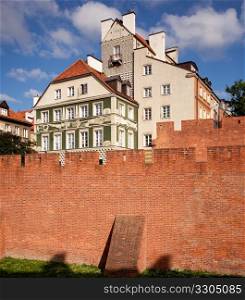 View towards the old town of Warsaw in Poland showing the Barbakan defensive building on the town walls