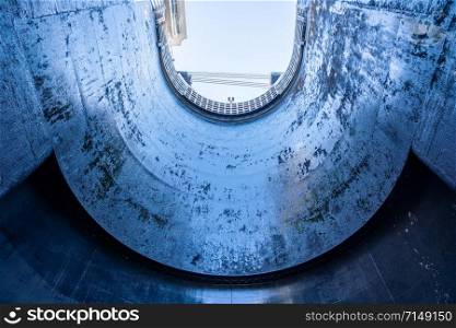 View towards the sky inside the very deep lock of the Barragem do Carrapatelo on Douro River in Portugal. View upwards inside the very deep lock of the Barrapatelo dam on River Douro in Portugal