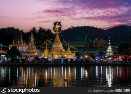 Viewpoint of Wat Phra That Chong Klang in the evening, beautiful market in front of the temple, Mae Hong Son, Thailand. Phra That Chong Klang temple. . Wat Phra That Chong Klang.