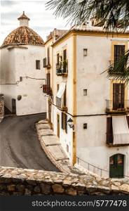 Views inside the old town of Ibiza Town with picturisque old buildings.