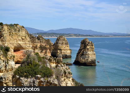 Views of the coastline from the cliff on a sunny summer day