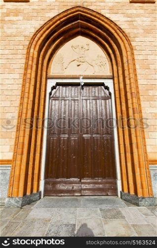 villa cortese italy church varese the old door entrance and mosaic sunny daY rose window