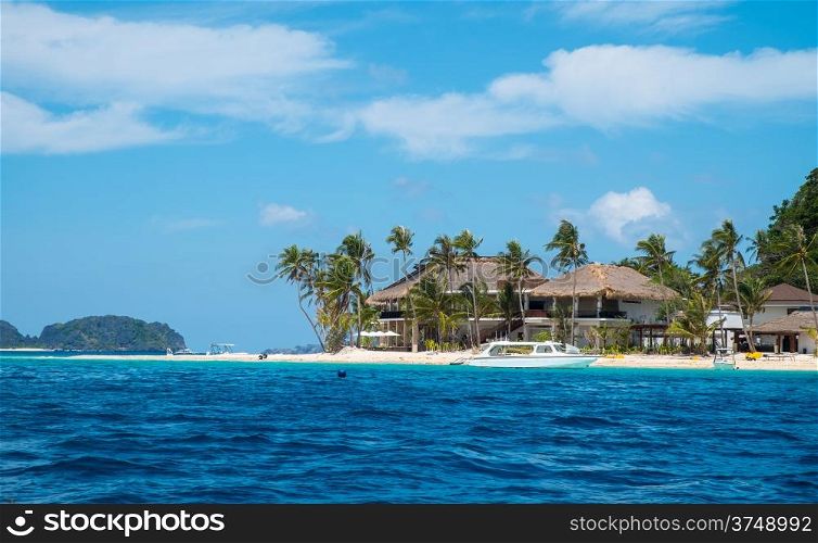 Villa on white sand tropical beach in Philippines