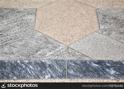 villadosia street lombardy italy varese abstract pavement of a curch and marble