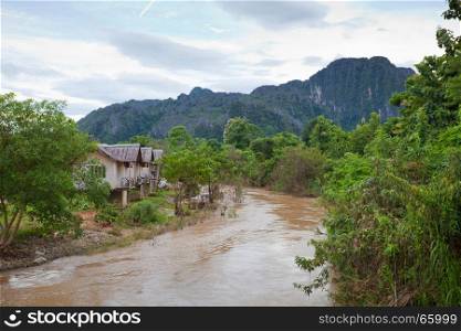 Village and mountain in Vang Vieng, Laos