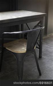Village cafe with metal table and chair, stock photo