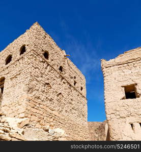 village house and cloudy sky in oman the old abandoned