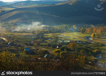 Village landscape panorama in the evening, Siberia, Russia. Village landscape panorama in the evening