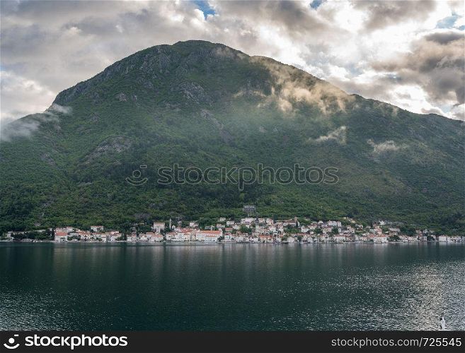 Village of Perast on coastline of Gulf of Kotor in Montenegro. Cruise up the Bay of Kotor in Montenegro