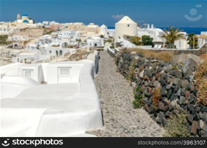 Village Oia with white houses on island Santorini. Greece.. Village Oia on Santorini.