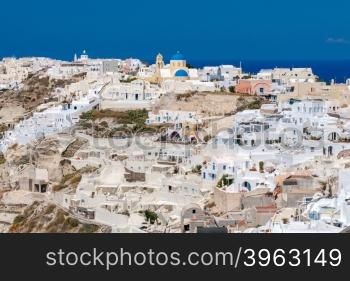 Village Oia with white houses on island Santorini. Greece.. Village Oia on Santorini.