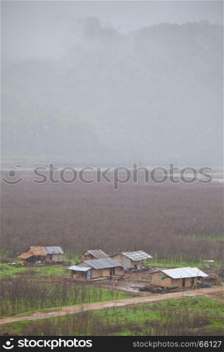 Village with green grass in the mountain