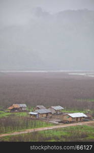 Village with green grass in the mountain