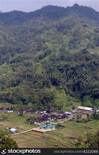 Village with mosque near mount in Sumatra, Indonesia