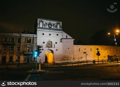 Vilnius, Lithuania: the Gate of Dawn, Lithuanian Ausros, Medininku vartai, Polish Ostra Brama, a city gate of Vilnius, one of its most important historical, cultural and religious monuments at night