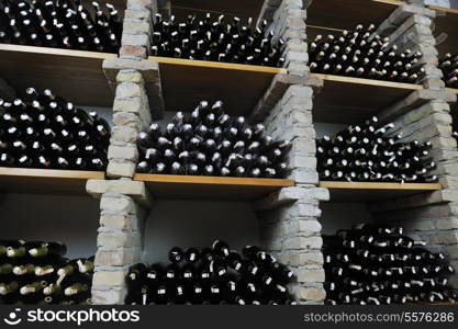 vine bar undergraund with many of different wine bottles
